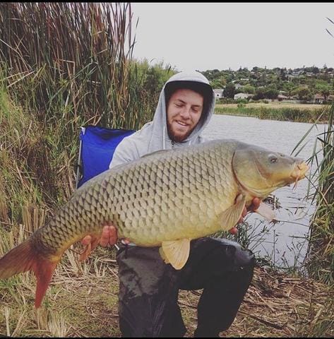 a person holding a fish